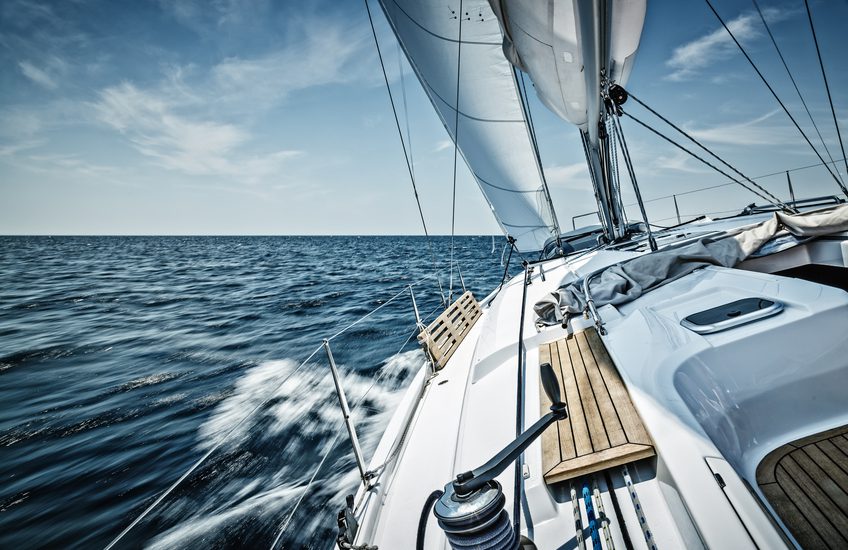 Sailing with sailboat. Long exposure.